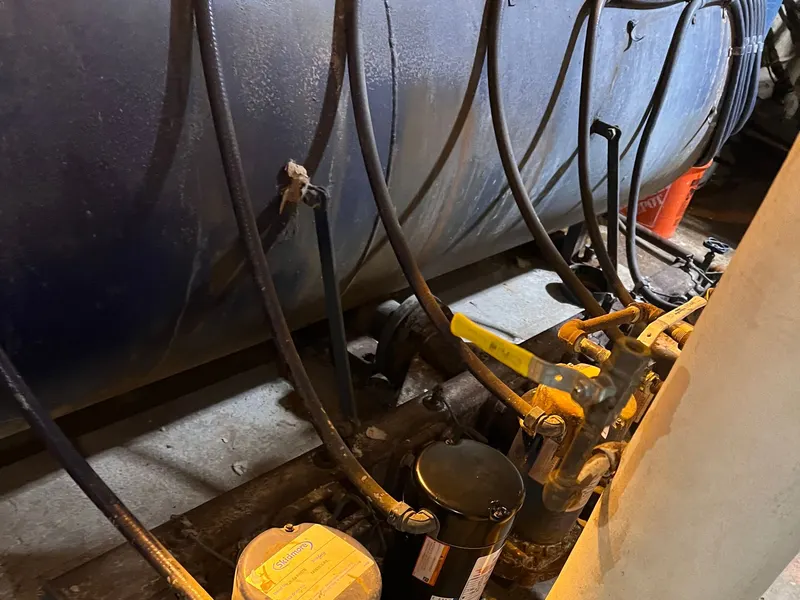 Heating equipment and gas-train piping in a building mechanical room.