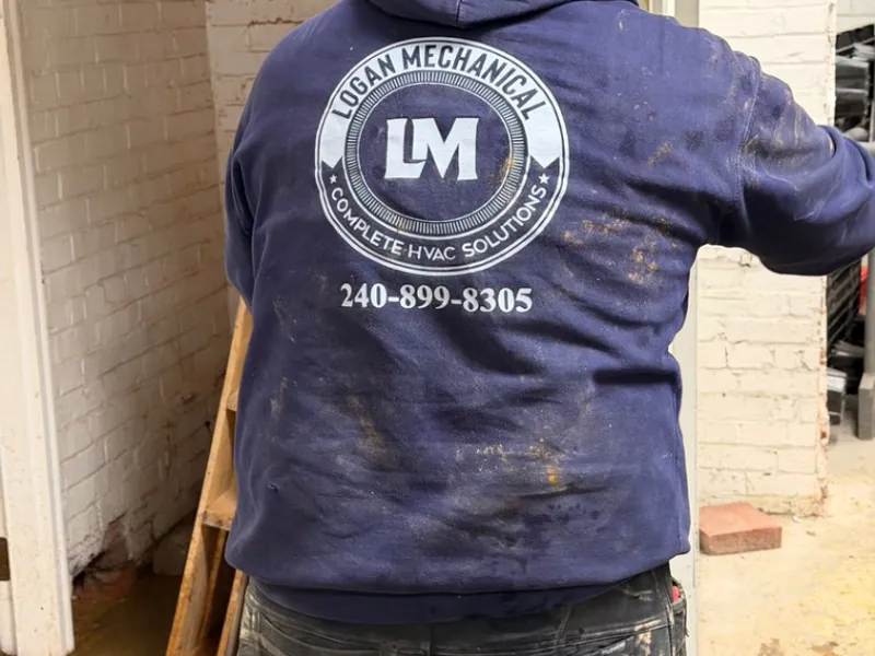 Logan Mechanical technician on a commercial job site